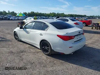 2014 Infiniti Q50 Hybrid Premium with VIN JN1AV7AP2EM690136, listed as a IAAI auction lot 42481510 with 203,832 mi miles and . Bid and sale history available at DreamBid. Image 3.