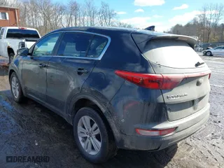 2018 Kia Sportage LX with VIN KNDPM3AC5J7380328, listed as a IAAI auction lot 41554927 with 197,778 mi miles. Bid and sale history available at carsss.com. Image 3.