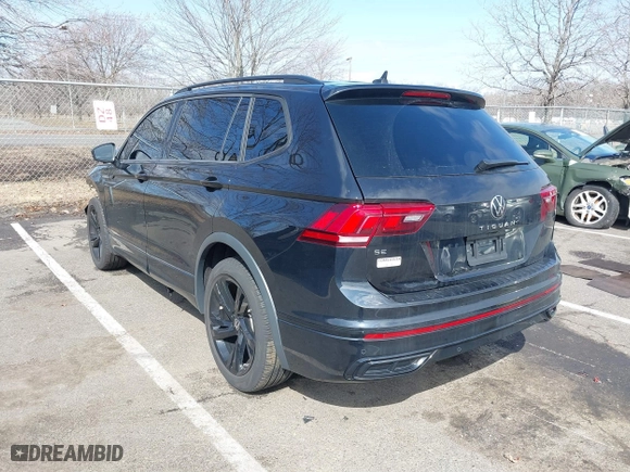 2023 Volkswagen Tiguan SE R-Line Black with VIN 3VVCB7AXXPM094621, listed as a IAAI auction lot 41737103 with 21,069 mi miles. Bid and sale history available at carsss.com. Image 3.