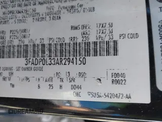 2010 Ford Fusion Hybrid with VIN 3FADP0L33AR294150, listed as a IAAI auction lot 42057023 with 197,497 mi miles. Bid and sale history available at carsss.com. Image 9.