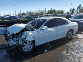 2000 Lincoln LS with VIN 1LNHM87A4YY912546, listed as a Copart auction lot 87760925 with 153,565 mi miles and Salvage Title. Bid and sale history available at carsss.com. Image 1.