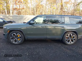 2022 Rivian R1S Launch Edition with VIN 7PDSGABL4NN000409, listed as a IAAI auction lot 41433164 with 39,603 mi miles. Bid and sale history available at carsss.com. Image 14.
