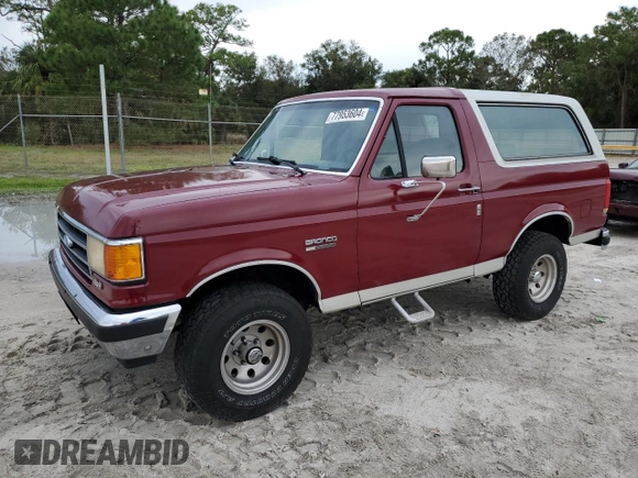 1990 Ford Bronco Custom with VIN 1FMEU15H2LLA70449, listed as a Copart auction lot 77953604 with 12,519 mi miles and Salvage Title. Bid and sale history available at DreamBid. Image 1.