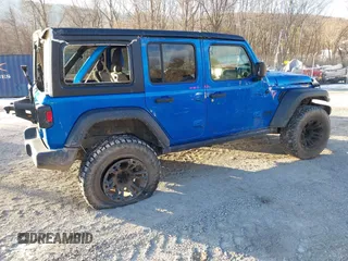 2021 Jeep Wrangler Unlimited Sport S with VIN 1C4HJXDN4MW779291, listed as a IAAI auction lot 41290109 with 43,379 mi miles and . Bid and sale history available at DreamBid. Image 4.