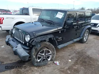 2016 Jeep Wrangler Unlimited 75th Anniversary with VIN 1C4BJWEG1GL221873, listed as a IAAI auction lot 41635788 with 148,493 mi miles. Bid and sale history available at carsss.com. Image 18.