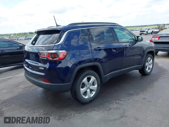 2018 Jeep Compass Latitude with VIN 3C4NJDBB2JT150463, listed as a IAAI auction lot 42452301 with 73,895 mi miles and . Bid and sale history available at DreamBid. Image 4.