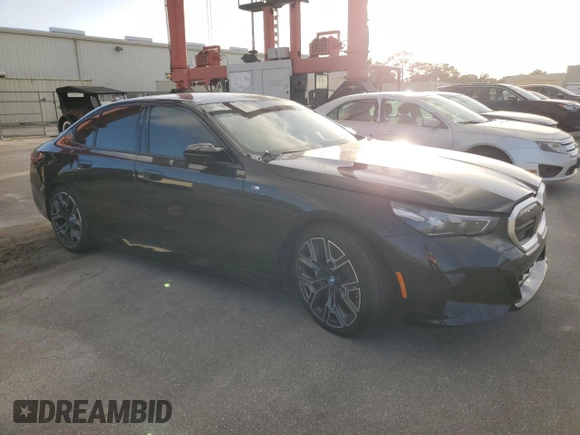 2024 BMW i5 M60 z VIN WBY43FK00RCP12947, wystawiony jako Copart lot #79117974 z przebiegiem Nie podano mil oraz Szkody całkowita. Historia ofert i sprzedaży dostępna na DreamBid. Obrazek 4.