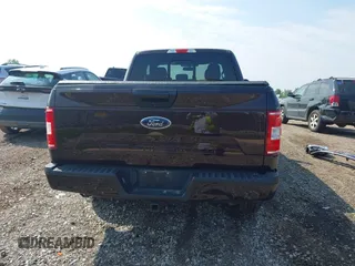 2018 Ford F-150 XL with VIN 1FTFX1E59JKG09710, listed as a IAAI auction lot 42458880 with 89,222 mi miles and . Bid and sale history available at DreamBid. Image 17.