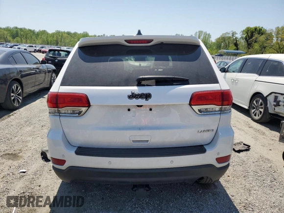 2019 Jeep Grand Cherokee Altitude with VIN 1C4RJEAG9KC662240, listed as a Copart auction lot 52871935 with 123,188 mi miles and Salvage title. Bid and sale history available at DreamBid. Image 6.
