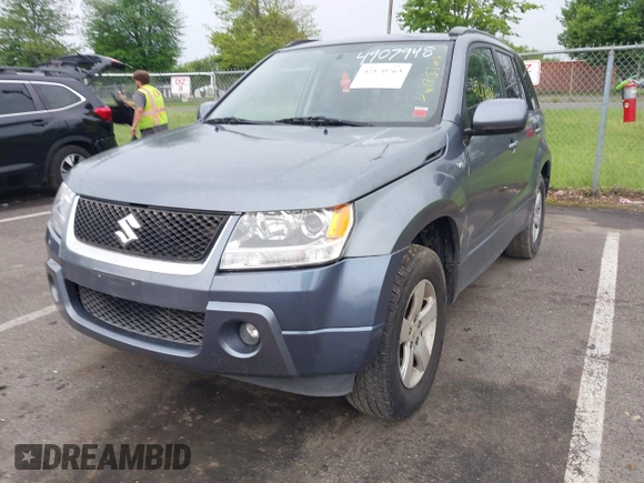 2006 Suzuki Grand Vitara XSport with VIN JS3TD944564103016, listed as a IAAI auction lot 42170763 with 127,442 mi miles and . Bid and sale history available at DreamBid. Image 2.