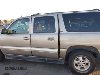 2003 Chevrolet Suburban LS with VIN 1GNEC16T43J269726, listed as a IAAI auction lot 41109855 with 122,820 mi miles. Bid and sale history available at carsss.com. Image 14.
