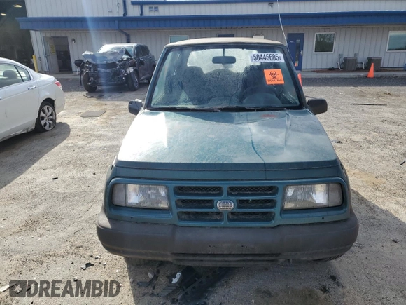 1996 Chevrolet Tracker z VIN 2CNBJ1863T6925397, wystawiony jako Copart lot #50446605 z przebiegiem 139 484 mil mil oraz Czysty tytuł • Clean title. Historia ofert i sprzedaży dostępna na DreamBid. Obrazek 5.