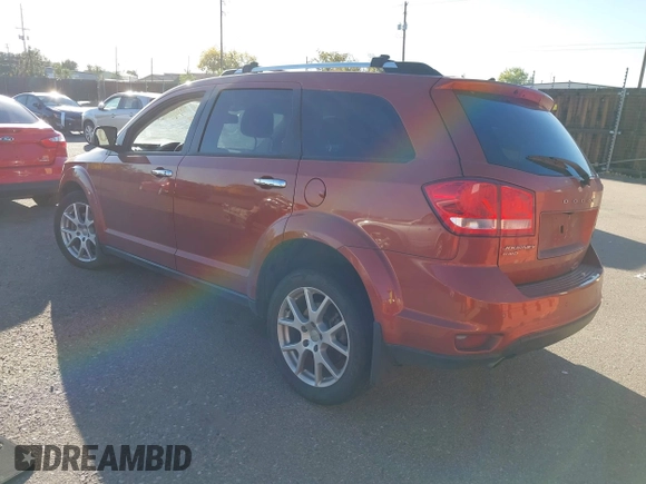2014 Dodge Journey R/T with VIN 3C4PDDFG4ET104127, listed as a IAAI auction lot 40702930 with 87,058 mi miles and . Bid and sale history available at DreamBid. Image 3.