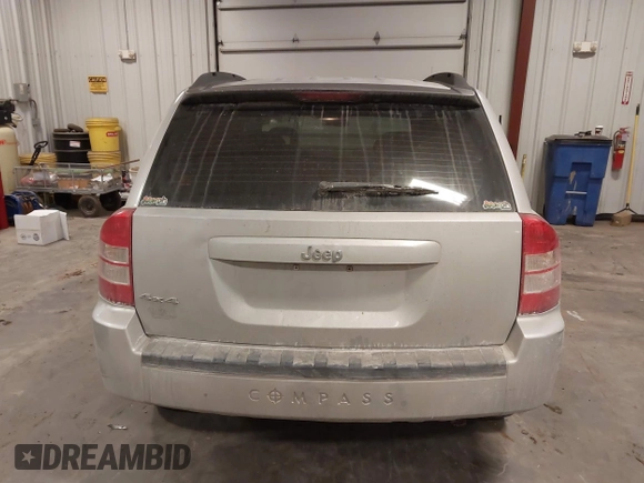 2007 Jeep Compass Sport with VIN 1J8FF47W57D598222, listed as a IAAI auction lot 41379480 with 181,919 mi miles. Bid and sale history available at carsss.com. Image 16.