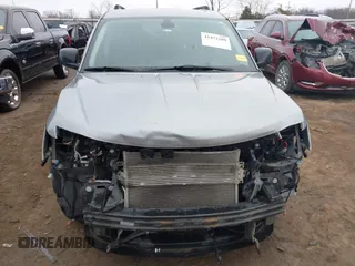 2019 Dodge Journey SE with VIN 3C4PDCBG9KT869149, listed as a IAAI auction lot 41472289 with 97,333 mi miles and . Bid and sale history available at DreamBid. Image 13.