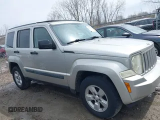 2009 Jeep Liberty Sport with VIN 1J8GN28K69W512320, listed as a IAAI auction lot 41970015 with 115,443 mi miles. Bid and sale history available at carsss.com. Image 13.