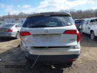 2017 Honda Pilot EX-L z VIN 5FNYF6H71HB061036, wystawiony jako IAAI lot #41891446 z przebiegiem 194 566 mil mil oraz . Historia ofert i sprzedaży dostępna na DreamBid. Obrazek 16.