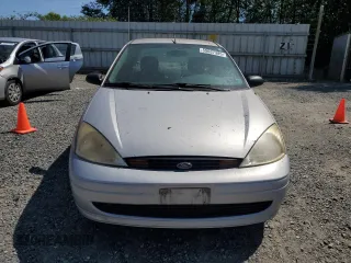 2001 Ford Focus LX с VIN 1FAFP33P61W357400, выставлен на аукционе Copart как лот 59637385 с пробегом 102 279 миль миль и Чистый • Clean title. История ставок и продаж доступна на DreamBid. Изображение 5.