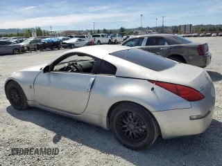 2003 Nissan 350Z Touring z VIN JN1AZ34EX3T016911, wystawiony jako Copart lot #54019395 z przebiegiem 163 228 mil mil oraz Czysty tytuł • Clean title. Historia ofert i sprzedaży dostępna na DreamBid. Obrazek 2.