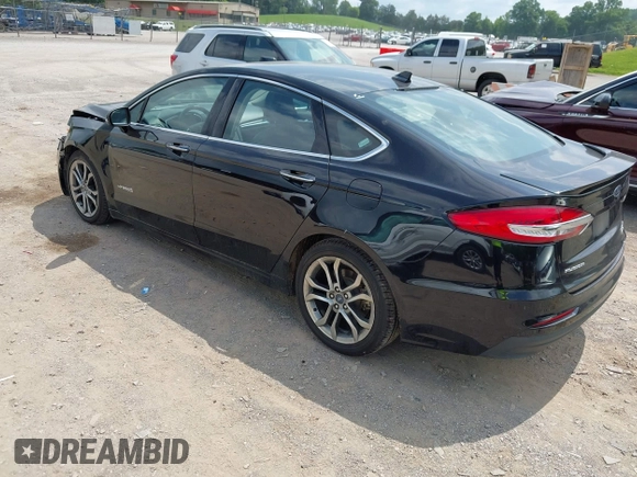 2019 Ford Fusion Titanium z VIN 3FA6P0RU0KR260239, wystawiony jako IAAI lot #42436643 z przebiegiem 114 631 mil mil oraz . Historia ofert i sprzedaży dostępna na DreamBid. Obrazek 3.