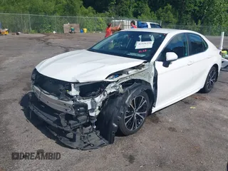 2019 Toyota Camry LE z VIN 4T1B11HK8KU708943, wystawiony jako IAAI lot #42221233 z przebiegiem 173 813 mil mil oraz . Historia ofert i sprzedaży dostępna na DreamBid. Obrazek 2.