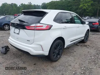 2023 Ford Edge SE z VIN 2FMPK4G95PBA49168, wystawiony jako IAAI lot #42403184 z przebiegiem 41 448 mil mil oraz . Historia ofert i sprzedaży dostępna na DreamBid. Obrazek 4.