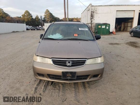 2003 Honda Odyssey LX z VIN 5FNRL18533B084504, wystawiony jako Copart lot #52674495 z przebiegiem 189 256 mil mil oraz Nie do naprawy • Non repairable. Historia ofert i sprzedaży dostępna na DreamBid. Obrazek 5.