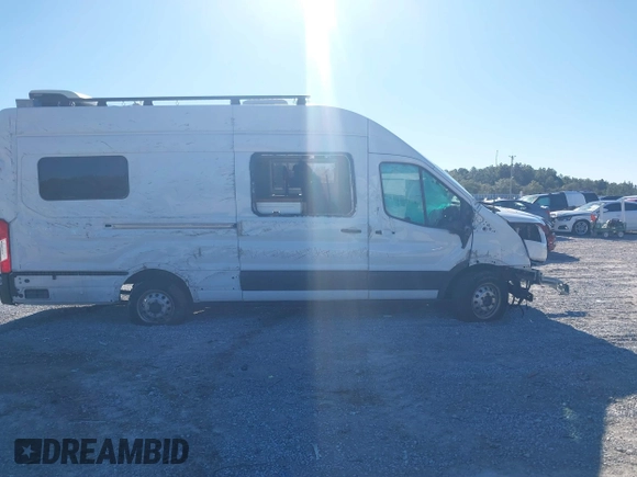 2022 Ford Transit Cargo with VIN 1FTBW3U85NKA01097, listed as a IAAI auction lot 41076643 with 24,786 mi miles and . Bid and sale history available at DreamBid. Image 13.