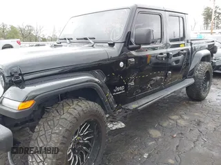 2022 Jeep Gladiator High Altitude z VIN 1C6HJTFG1NL164764, wystawiony jako IAAI lot #41727357 z przebiegiem 28 222 mil mil oraz . Historia ofert i sprzedaży dostępna na DreamBid. Obrazek 6.