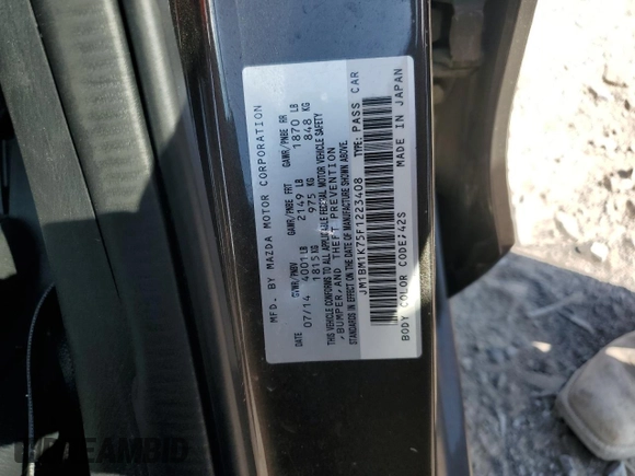2015 Mazda 3 i Sport with VIN JM1BM1K75F1223408, listed as a Copart auction lot 54992705 with 93,925 mi miles and Salvage Title. Bid and sale history available at DreamBid. Image 13.