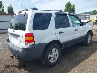 2006 Ford Escape XLT with VIN 1FMCU93106KA36063, listed as a IAAI auction lot 42610043 with 193,703 mi miles and . Bid and sale history available at DreamBid. Image 4.