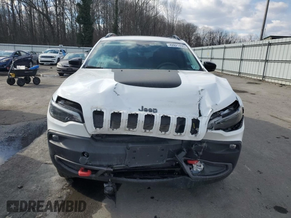2022 Jeep Cherokee Trailhawk with VIN 1C4PJMBX7ND503943, listed as a Copart auction lot 42821495 with 24,256 mi miles and Salvage Title. Bid and sale history available at carsss.com. Image 5.