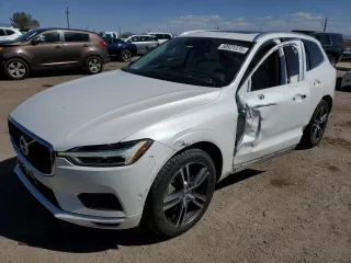 2018 Volvo XC60 Momentum с VIN LYVA22RK3JB097438, выставлен на аукционе Copart как лот 50931375 с пробегом 103 743 миль миль и Списание • Salvage title. История ставок и продаж доступна на DreamBid. Изображение 1.