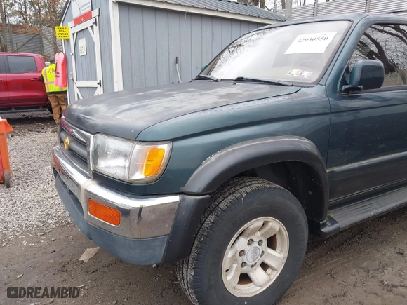 1997 Toyota 4Runner Limited with VIN JT3HN87R1V0078046, listed as a IAAI auction lot 42030550 with 163,683 mi miles. Bid and sale history available at carsss.com. Image 6.