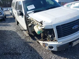 2014 Ford F-150 XL with VIN 1FTFW1EF2EFB93610, listed as a IAAI auction lot 41515501 with 211,415 mi miles and . Bid and sale history available at DreamBid. Image 6.