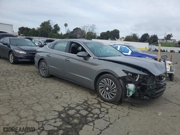2022 Hyundai Sonata Hybrid SEL with VIN KMHL34JJ2NA043349, listed as a Copart auction lot 44950135 with 70,128 mi miles and Salvage Title. Bid and sale history available at carsss.com. Image 4.