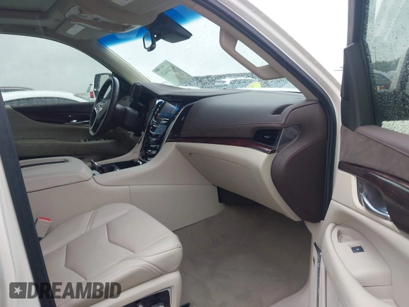2015 Cadillac Escalade ESV Premium z VIN 1GYS4TKJ6FR708255, wystawiony jako IAAI lot #42244621 z przebiegiem 31 407 mil mil oraz . Historia ofert i sprzedaży dostępna na DreamBid. Obrazek 5.
