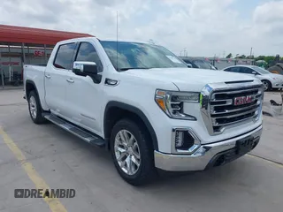 2019 GMC Sierra 1500 SLT z VIN 3GTU9DED4KG197425, wystawiony jako IAAI lot #42105713 z przebiegiem 103 061 mil mil oraz . Historia ofert i sprzedaży dostępna na DreamBid. Obrazek 1.