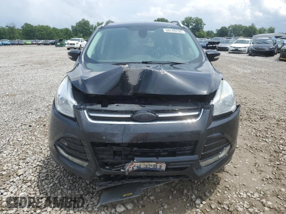 2015 Ford Escape Titanium with VIN 1FMCU9J91FUA38787, listed as a Copart auction lot 59749735 with 132,536 mi miles and Salvage title. Bid and sale history available at DreamBid. Image 5.