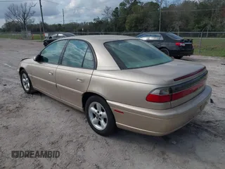 1998 Cadillac Catera z VIN W06VR52R3WR179841, wystawiony jako IAAI lot #41535621 z przebiegiem 103 204 mil mil oraz . Historia ofert i sprzedaży dostępna na DreamBid. Obrazek 3.