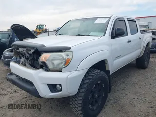 2013 Toyota Tacoma z VIN 5TFLU4EN2DX076815, wystawiony jako IAAI lot #41344839 z przebiegiem 311 083 mil mil oraz . Historia ofert i sprzedaży dostępna na DreamBid. Obrazek 17.