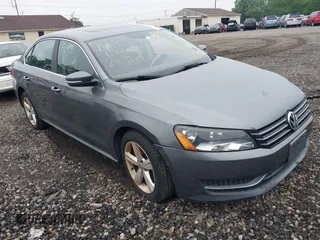 2013 Volkswagen Passat SE with VIN 1VWBP7A32DC047750, listed as a IAAI auction lot 42469570 with Not provided miles and . Bid and sale history available at DreamBid. Image 1.