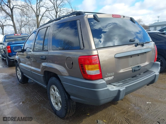 2001 Jeep Grand Cherokee Laredo with VIN 1J4GW48S21C572272, listed as a IAAI auction lot 41695754 with 169,229 mi miles. Bid and sale history available at carsss.com. Image 3.