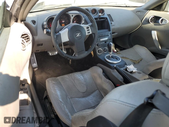 2004 Nissan 350Z Touring z VIN JN1AZ34E94T062960, wystawiony jako Copart lot #55822235 z przebiegiem 186 879 mil mil oraz Szkoda całkowita • Salvage title. Historia ofert i sprzedaży dostępna na DreamBid. Obrazek 8.