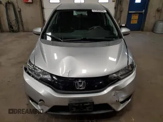 2015 Honda Fit LX с VIN 3HGGK5H56FM720996, выставлен на аукционе Copart как лот 57565945 с пробегом 90 222 миль миль и Списание • Salvage title. История ставок и продаж доступна на DreamBid. Изображение 5.