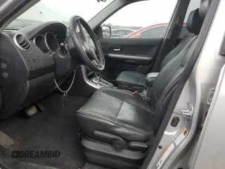 2010 Suzuki Grand Vitara Limited z VIN JS3TE0D73A4100112, wystawiony jako Copart lot #50907365 z przebiegiem 146 484 mil mil oraz Szkoda całkowita • Salvage title. Historia ofert i sprzedaży dostępna na DreamBid. Obrazek 7.