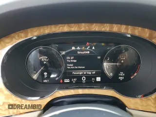 2022 Bentley Bentayga V8 z VIN SJAAM2ZV9NC016403, wystawiony jako Copart lot #51584975 z przebiegiem 4 462 mil mil oraz Szkoda całkowita • Salvage title. Historia ofert i sprzedaży dostępna na DreamBid. Obrazek 9.