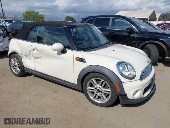 2012 MINI Convertible z VIN WMWZN3C53CT134194, wystawiony jako IAAI lot #42261686 z przebiegiem 104 099 mil mil oraz . Historia ofert i sprzedaży dostępna na DreamBid. Obrazek 1.