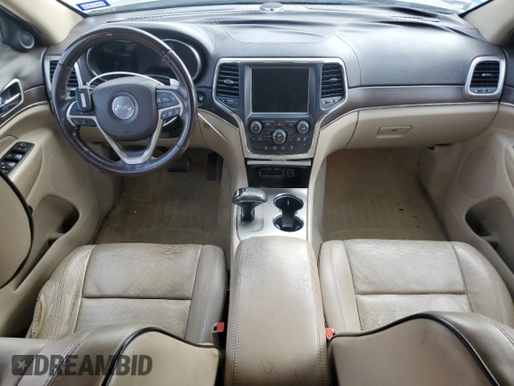 2015 Jeep Grand Cherokee Overland with VIN 1C4RJFCT6FC628729, listed as a Copart auction lot 44979155 with 105,959 mi miles and Salvage Title. Bid and sale history available at DreamBid. Image 8.