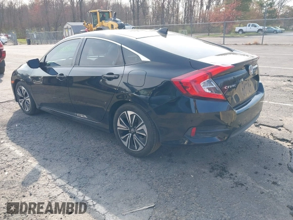 2016 Honda Civic Sedan EX-L with VIN 2HGFC1F77GH636904, listed as a IAAI auction lot 42090609 with 176,968 mi miles. Bid and sale history available at carsss.com. Image 3.